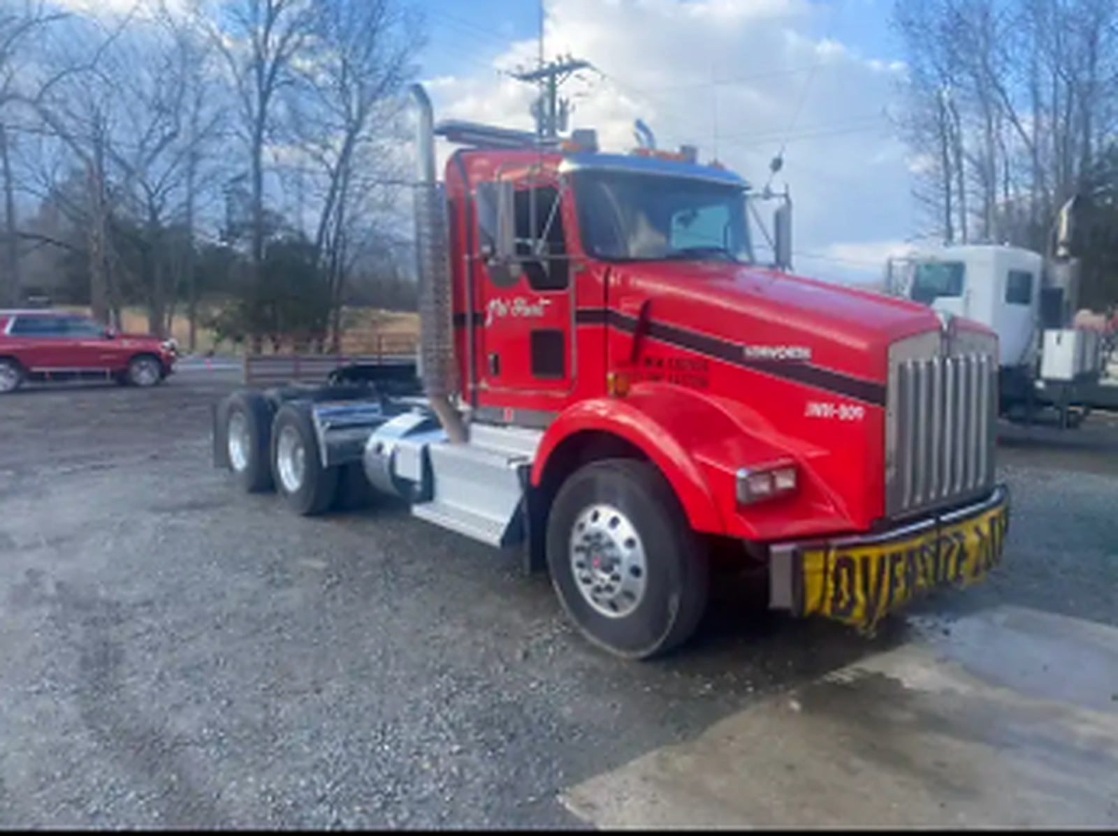 Red JW Hart Transport semi truck cab ready for the next haul